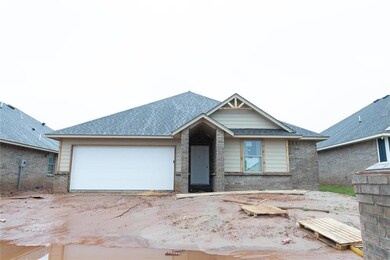 View of front facade featuring an attached garage,
