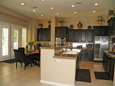 Kitchen. Kitchen features espresso finished cabine
