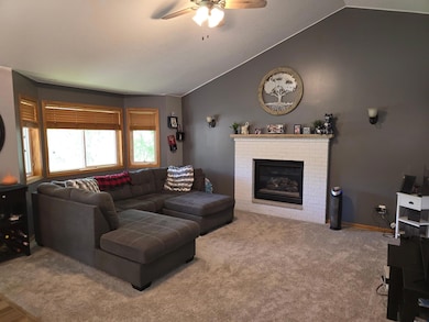 Vaulted ceilings and plenty of natural light in this living room.