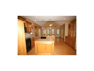 BIRCH CABINETS! ISLAND & HARDWOOD FLOORS!