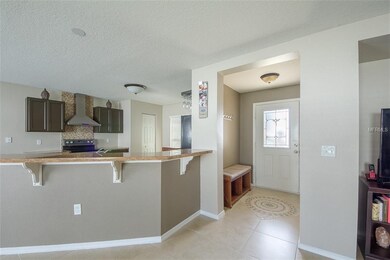 Welcoming foyer invites you into the open living s
