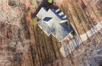 This home is beautifully situated on a one acre, p