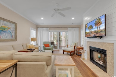 Living room with light wood-type flooring, a firep