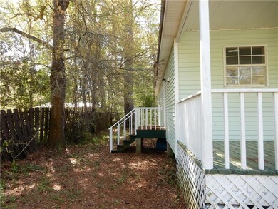 LEFT SIDE OF HOUSE, SIDE DOOR WITH 4 STEP PLATFORM
