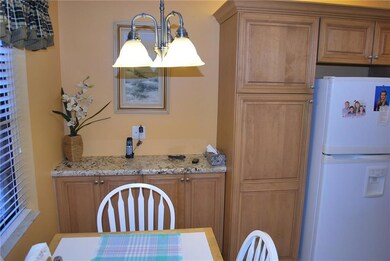 EAT IN KITCHEN EXTRA WOOD CABINETS GRANITE COUNTER