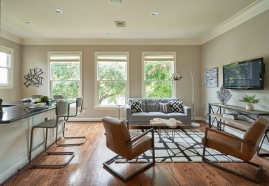 Family room looks out onto leafy views