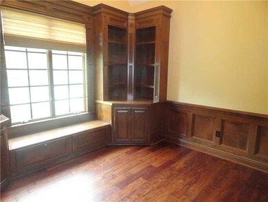 Den. STATELY DEN IS IDEALLY SUITED FOR A HOME OFFI