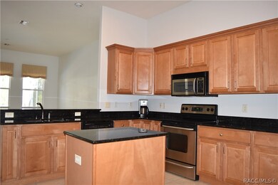 Kitchen island, granite counter tops, open to fami