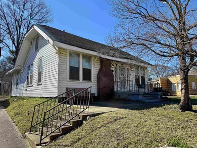 The driveway is shared with the house on the south side.