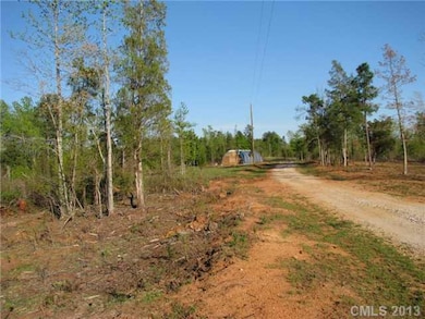 Exterior Front - Gravel Driveway and Power