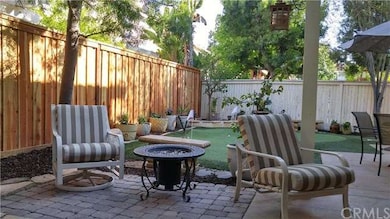 Relax in your beautiful backyard! Sit back on a cu