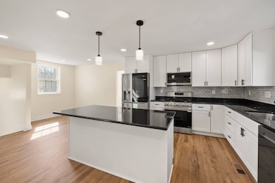 Large center island w/ ample cabinetry