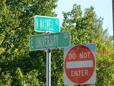 Located at the corner of N Maxwell and E University, behind Broadway Cafe.