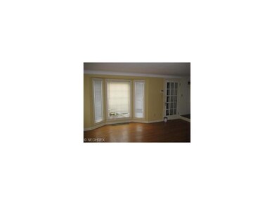large living room with hardwood floors