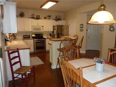 Kitchen. Large Breakfast Bar for Coffee - All Stainless Appliances Stay.