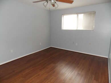 bedroom with hardwood floors