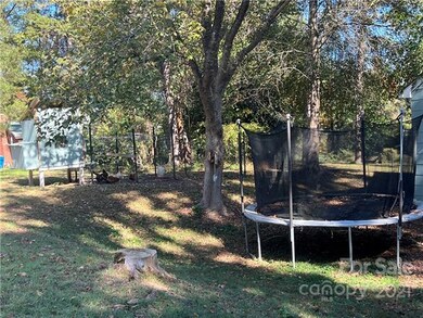 Large backyard, complete with matching chicken coo