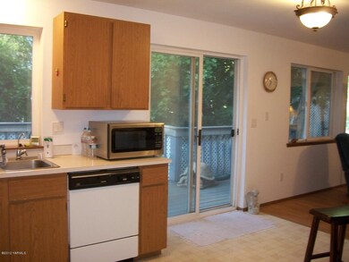 Kitchen with Sliders to Back Deck