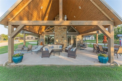 View of patio / terrace featuring an outdoor hangout area and a gazebo