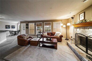 Family room overlooks the deck and backyard and is