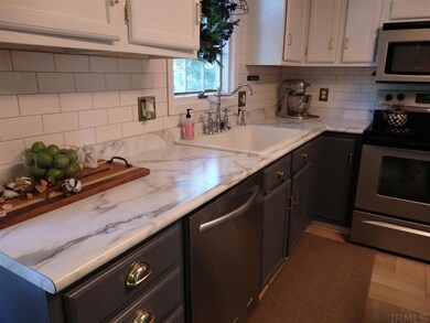 new subway tile backsplash, new countertops and ti