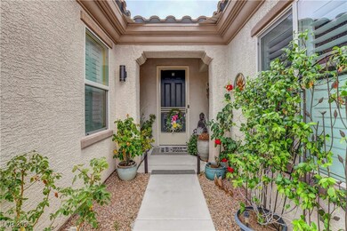 Property entrance with stucco siding