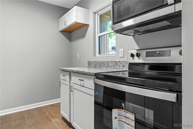 Kitchen featuring appliances with stainless steel