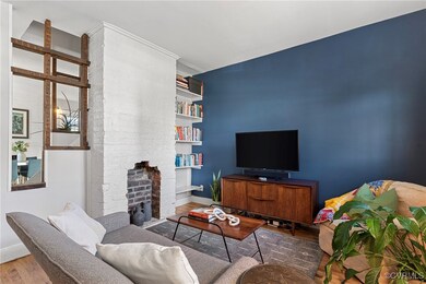 Living room featuring hardwood / wood flooring, bu
