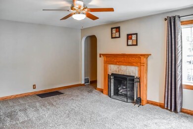 Living room with a fireplace.