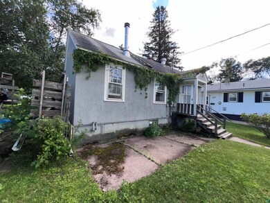 Exterior space featuring a front yard