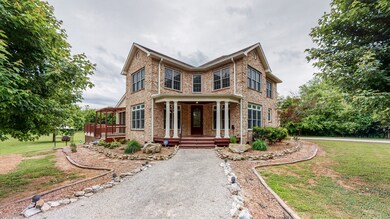 Lovely covered front porch at main entrance