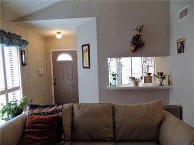Entry leads into the Living & Dining Room with 22'