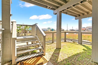 Stairs go down into a small fenced area perfect for pets. Gate at the top of the stairs as well.