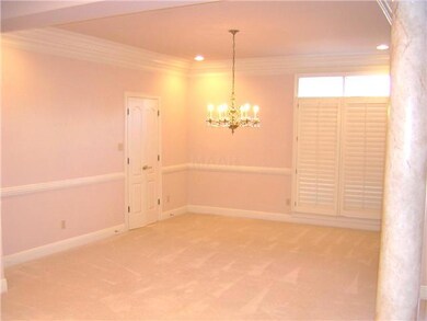 The formal dining room is quite spacious and can e