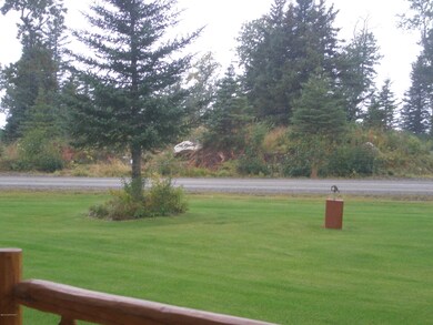 Cabin Exterior Front Yard with Well