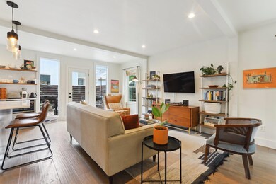 Living room featuring hardwood / wood-style floor