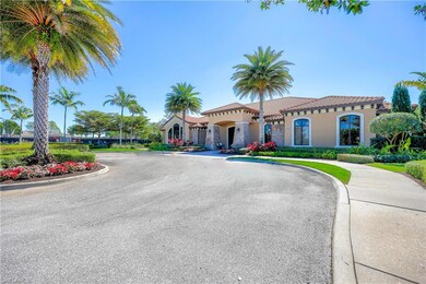 View of front of property featuring stucco siding, a tiled roof, and stone siding