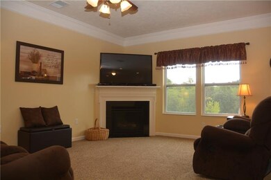 Large family room with large windows to allow a lo