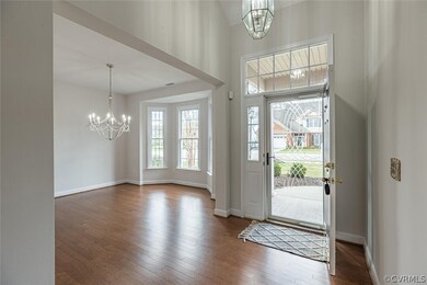 Foyer with soaring ceiling