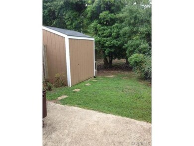 Rear private yard with shed and patio