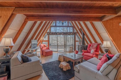 open floor plan, great room with wood burning stov