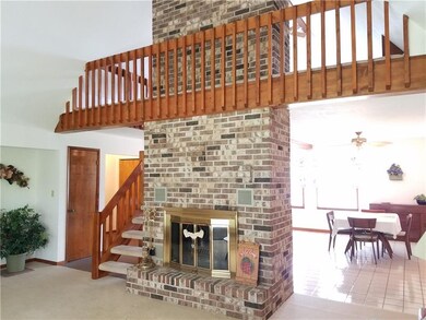Stunning fireplace with vaulted ceilings in the ma
