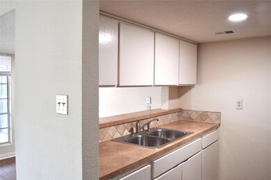 Kitchen with a wealth of natural light, visible v