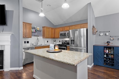 Kitchen featuring stainless steel appliances, vau