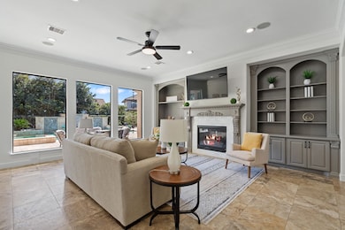 Spacious living room with a wall of windows offeri
