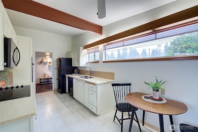 Front entry and kitchen.