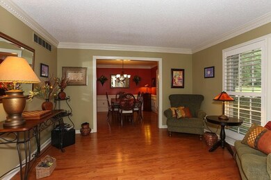 Hardwood for miles! Plantation shutters and crisp 