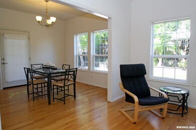 Both rooms look out onto the back yard.