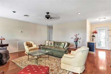 Spacious living room with wood floors.