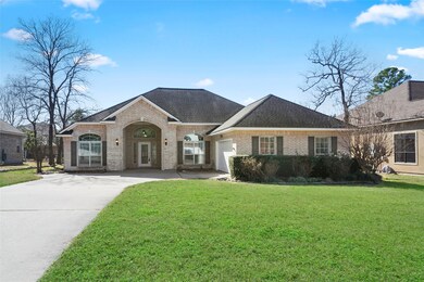 Closer look at the front of the home; side load garage so the door doesn't face the street, and large covered front porch.